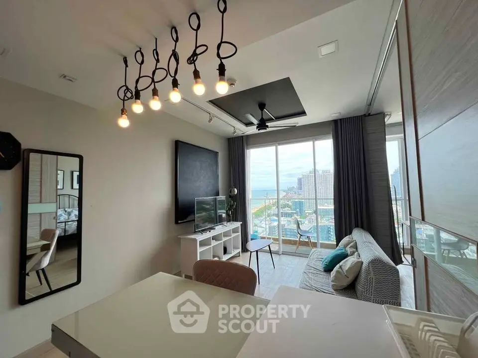Modern living room with stylish lighting and stunning city view