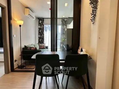 Modern apartment interior with cozy living room and dining area, featuring stylish decor and natural light.