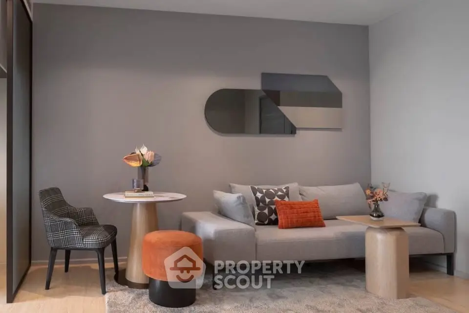 Modern living room with stylish decor and comfortable seating in a contemporary apartment.