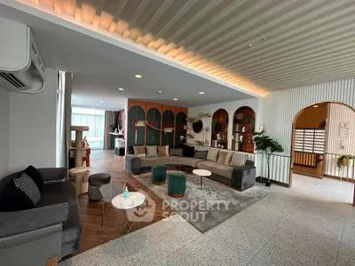 Spacious modern living room with stylish decor and cozy seating area