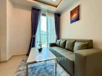Cozy living room with modern sofa and large window view