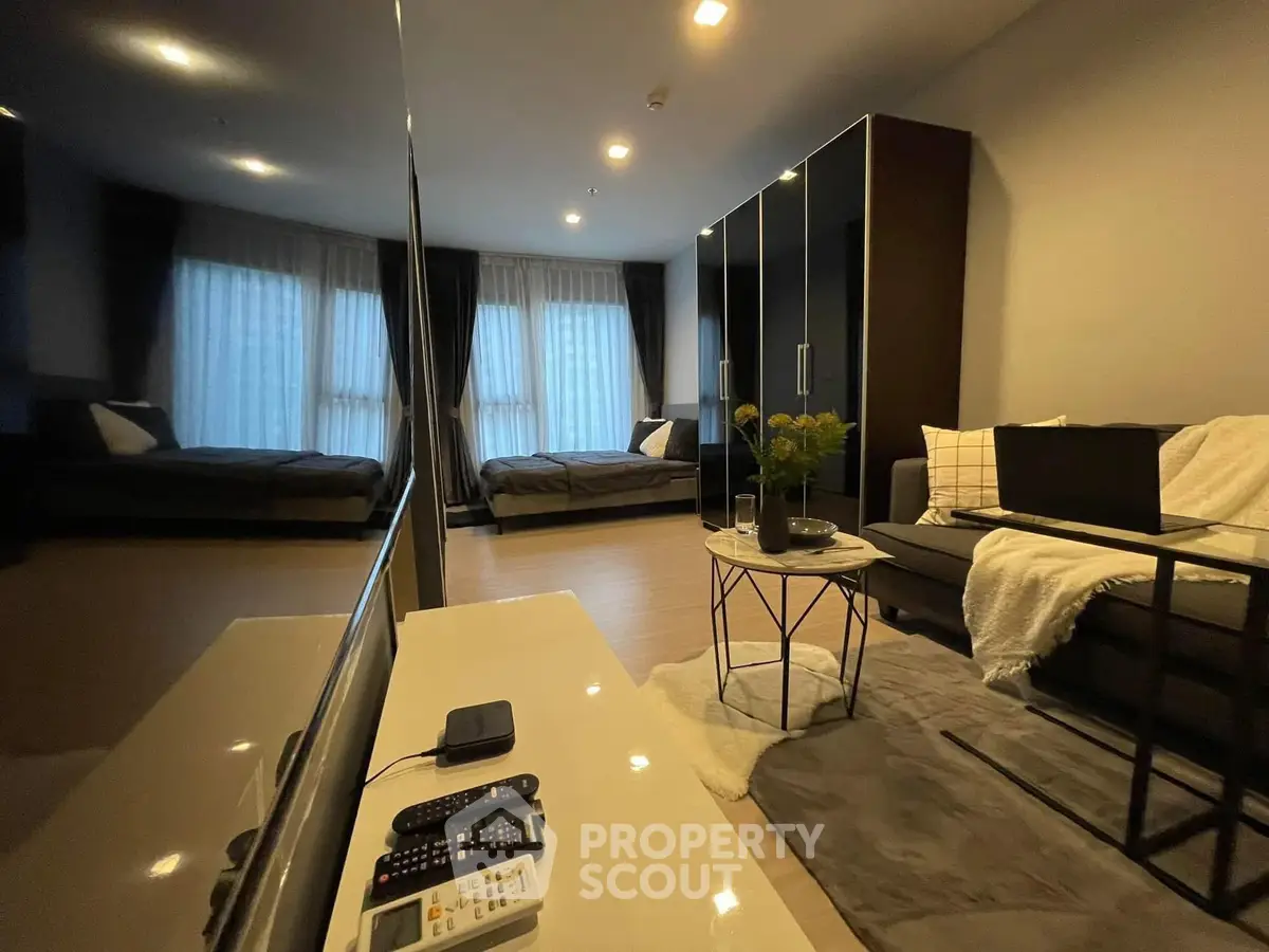 Modern living room with sleek furniture and ambient lighting