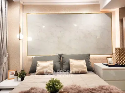 Luxurious bedroom with elegant decor and plush bedding