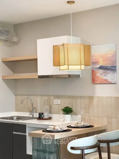 Modern kitchen with stylish pendant light and open shelving