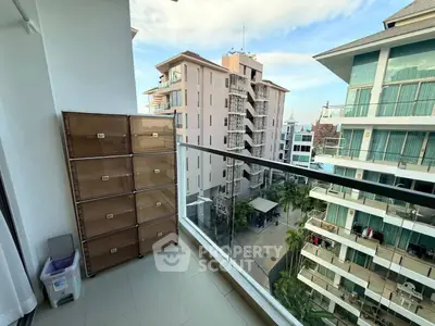 Modern balcony with city view in high-rise apartment
