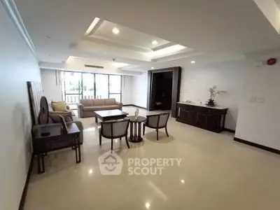 Spacious living room with elegant furniture and natural light