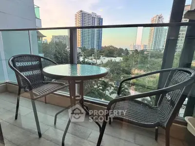 Charming balcony with city view, perfect for relaxing and enjoying the skyline.