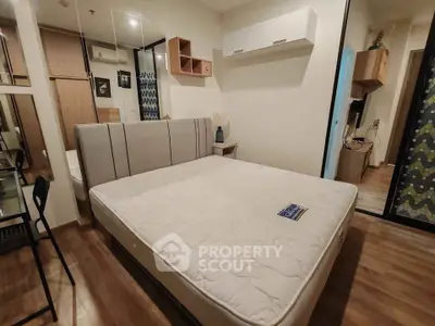 Modern bedroom with stylish decor and spacious layout in a contemporary apartment.