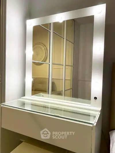 Elegant vanity mirror with lights in modern bedroom setting