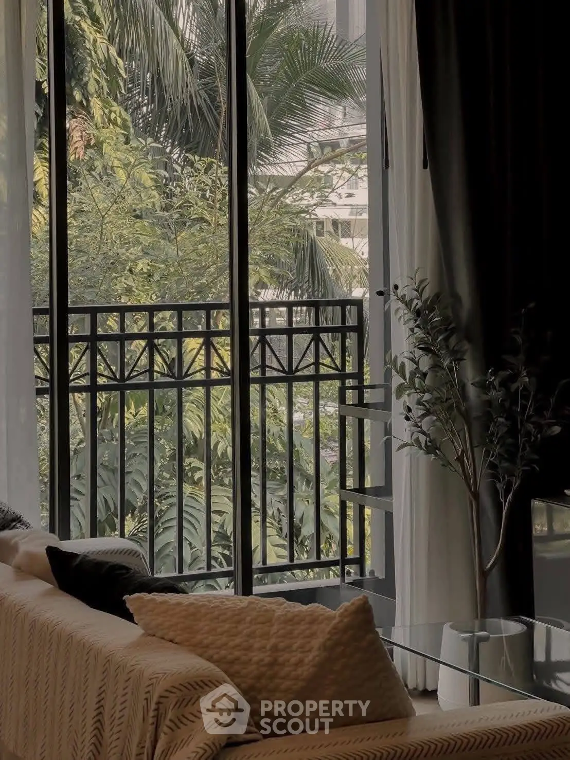 Stylish living room with lush garden view and elegant decor