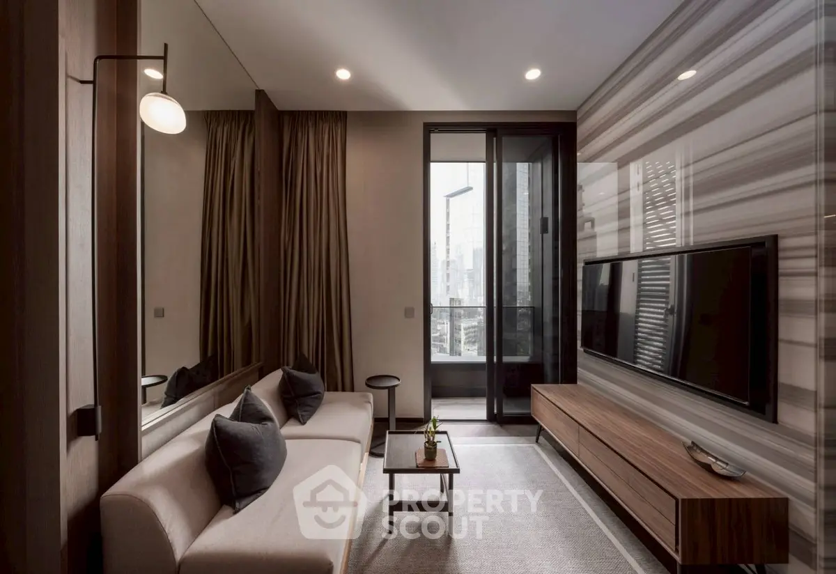 Modern living room with sleek design, featuring a large TV, stylish sofa, and floor-to-ceiling windows with city view.