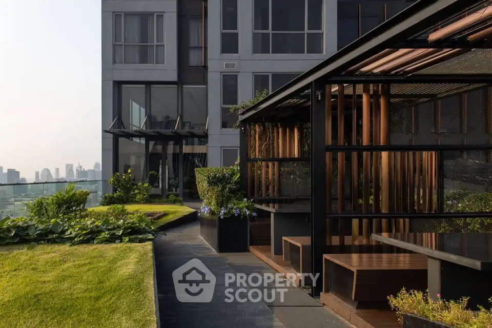 Luxurious rooftop garden with stunning city views and modern seating area.