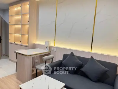 Modern living room with stylish furniture and elegant lighting
