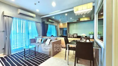 Modern living room with elegant decor and large windows in a stylish apartment.