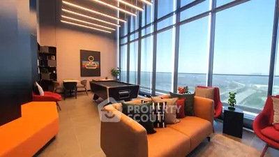 Luxurious modern living room with floor-to-ceiling windows and stylish decor.