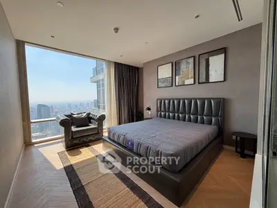 Luxurious bedroom with stunning city view and elegant decor