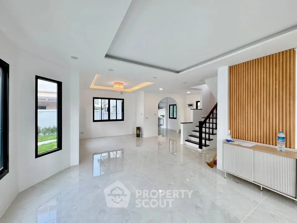 Spacious modern living room with elegant design and natural light