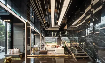Luxurious modern living room with high ceilings and elegant decor