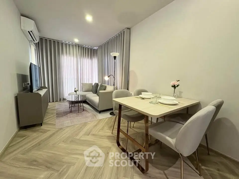 Modern living room with elegant dining area and stylish decor