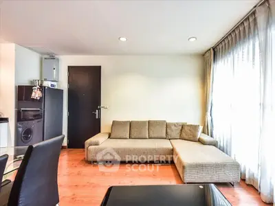 Modern living room with stylish sofa and natural light