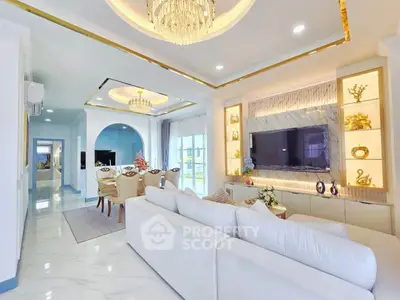 Luxurious living room with elegant chandelier and modern decor