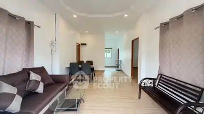 Spacious living room with modern furniture and elegant decor