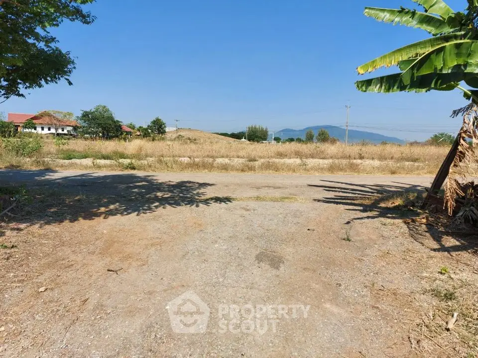 Expansive land plot with scenic mountain views, perfect for development or investment opportunities.