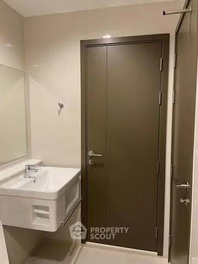 Modern bathroom with sleek sink and minimalist design