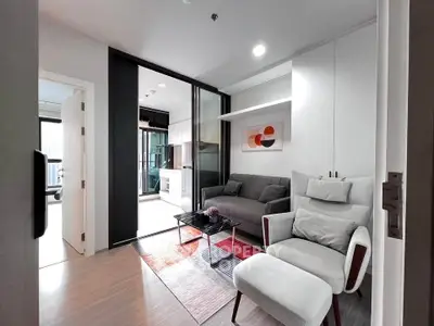 Modern living room with stylish furniture and open layout in a contemporary apartment.