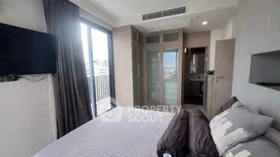 Modern bedroom with balcony view and stylish decor in urban apartment