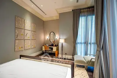 Luxurious bedroom with elegant decor and natural light