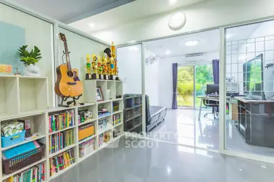 Spacious study room with modern decor and garden view