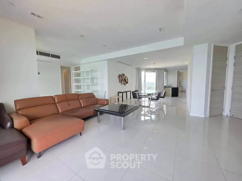 Spacious modern living room with sleek furniture and open layout