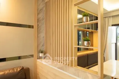 Modern living room with stylish wooden partition and decorative plants