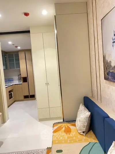 Modern living room with stylish decor and open kitchen layout