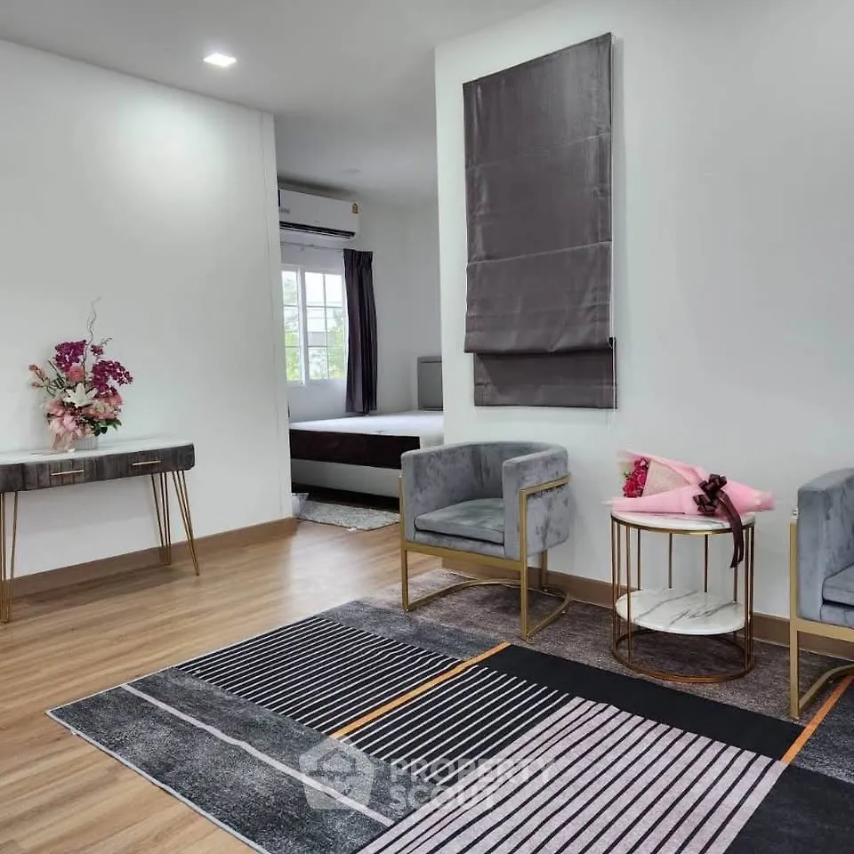 Modern living room with stylish decor and cozy seating area
