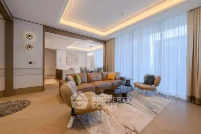 Luxurious modern living room with elegant furniture and large windows in a high-end apartment.