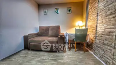 Cozy living room with brown sofa and stylish decor