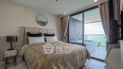 Luxurious bedroom with ocean view and private balcony
