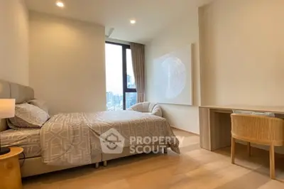 Modern bedroom with city view, stylish decor, and cozy ambiance