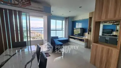 Modern living room with stunning sea view, open layout, and stylish decor
