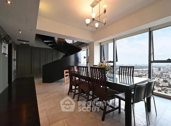 Luxurious dining area with panoramic city views and elegant spiral staircase.
