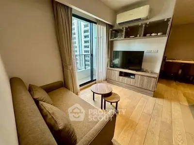 Cozy living room with modern furniture and balcony view in urban apartment