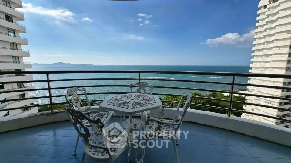 Stunning ocean view from spacious balcony in luxury high-rise apartment