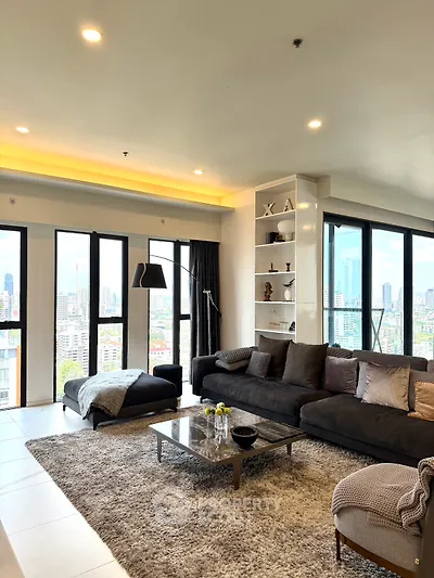 Luxurious living room with panoramic city views and modern decor