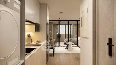 Modern open layout kitchen with sleek appliances and cozy living area