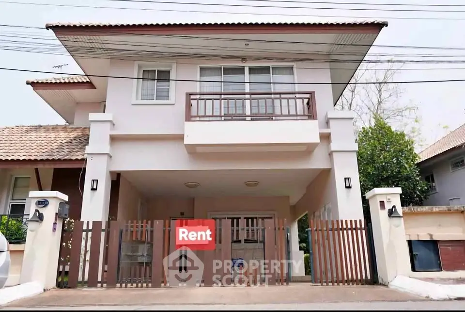 Charming two-story house for rent with spacious balcony and modern design.
