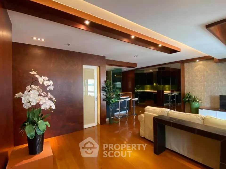 Luxurious living room with elegant wooden flooring and modern decor