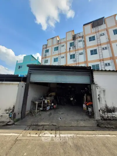 Spacious garage with storage potential in urban residential building