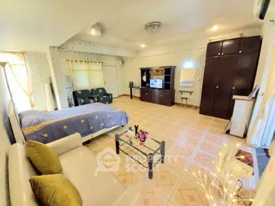 Spacious studio apartment with cozy decor and modern amenities